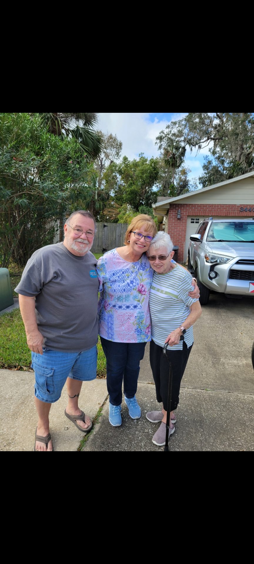 Right to Left: Janet Marion, Martha Bass, Gary Bass. November, 2024, in front of the Marion home.