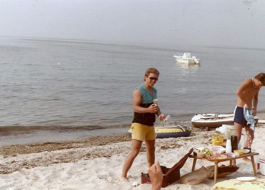 John Faletti, winner  of a Brewster Wimbledon Tennis  match, Booth Cottages beach, Brewster MA. Circa 1981
