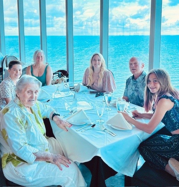 Rosemary dining TOP of Daytona with Kassar great grandchildren and Millers