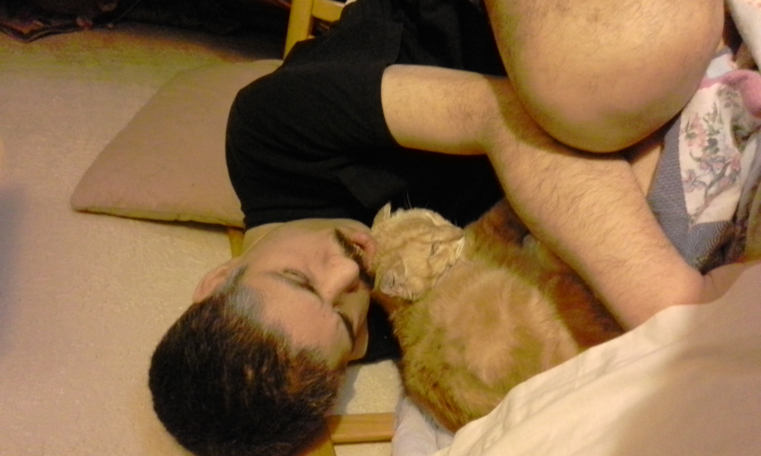 Pat Cuddling with Tiger