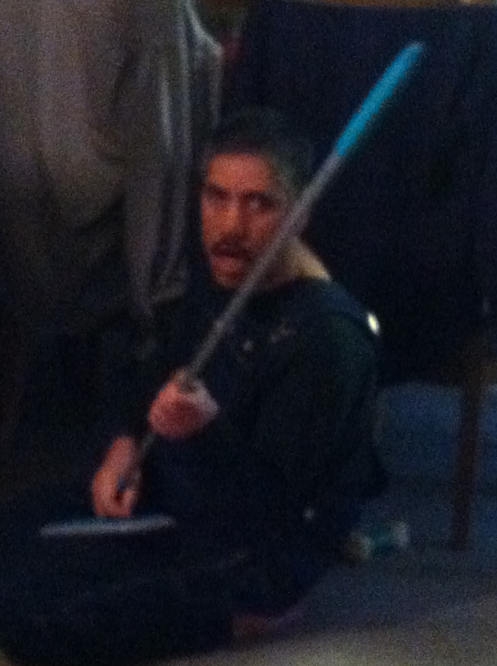 with broom in hand and acting like a jedi