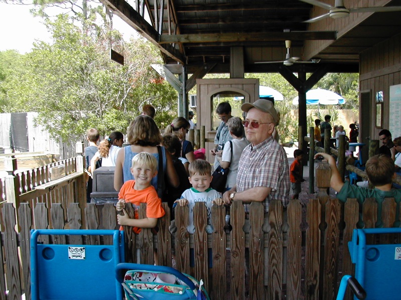 Grandpa waiting in line for the train at the Brevard County Zoo with three of his great grandchildren.    Miss and love you Grandpa!