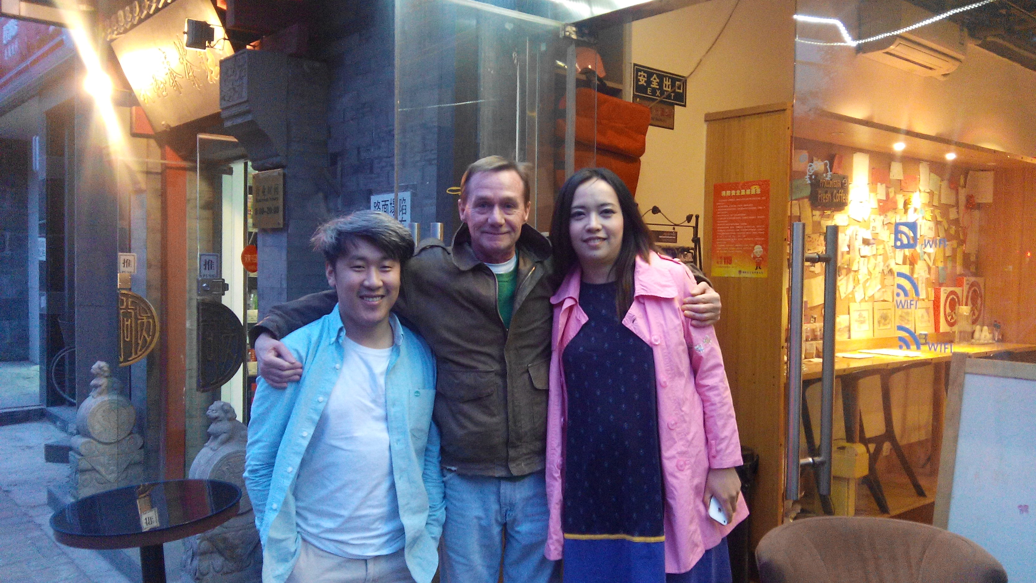 Denis with Lisa and Ethan in front of Tomato cafe in Beijing.