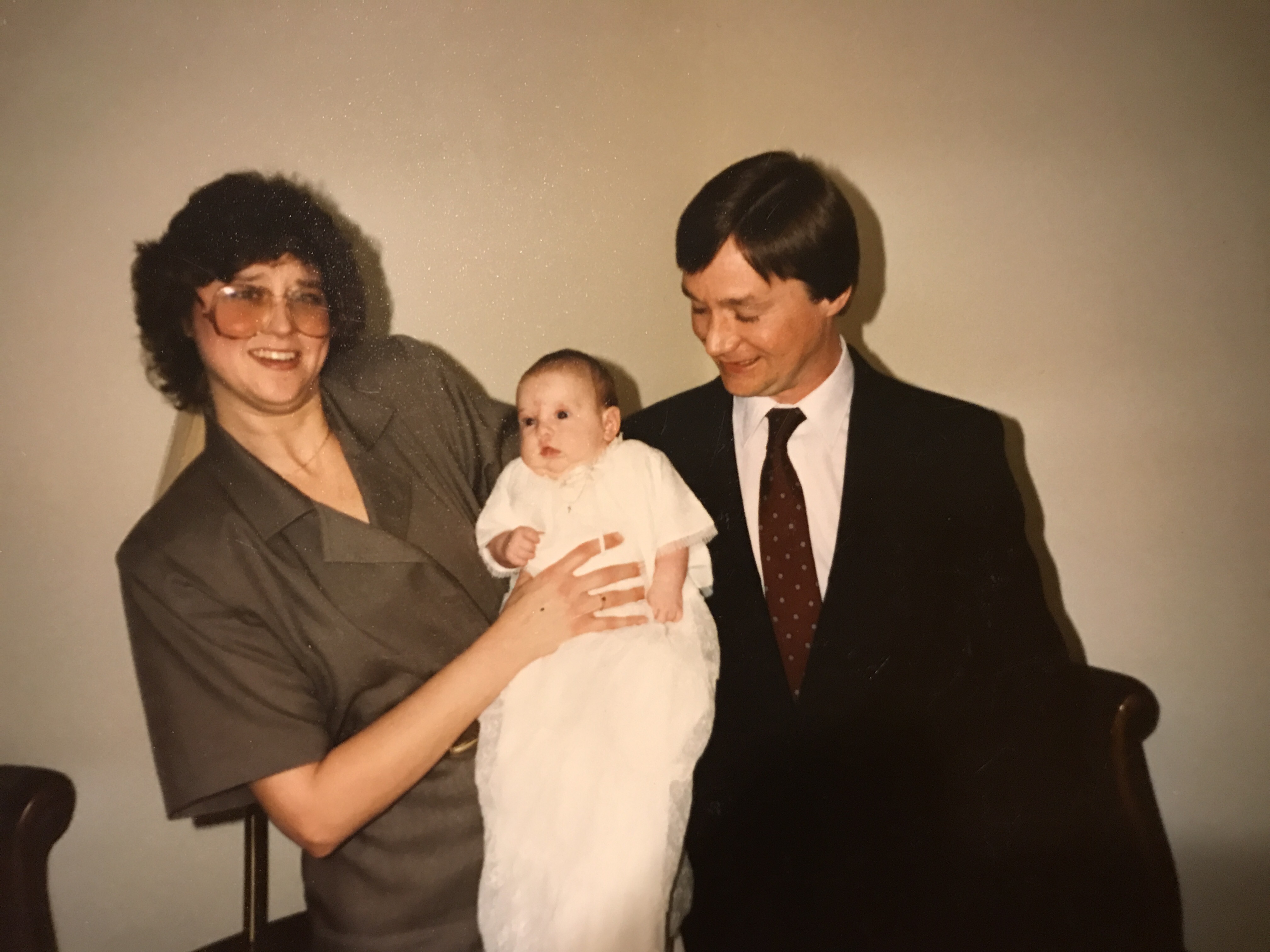 A great photo from my baptism with my godparents. I love how Denis is looking lovingly at me.