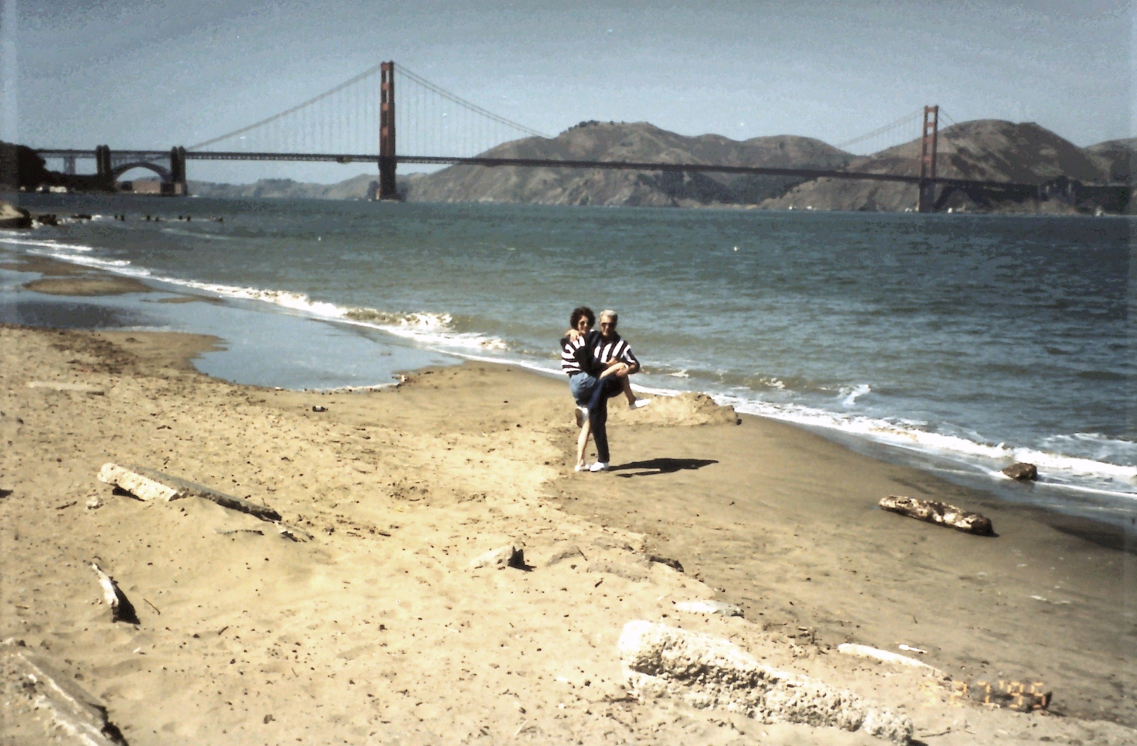 1995 SF trip<br />
Richard and Kathy San Francisco Bay beach Golden Gate Bridge background