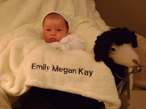 This is Emily with a blanket and basket Kay gave her. We still love both!