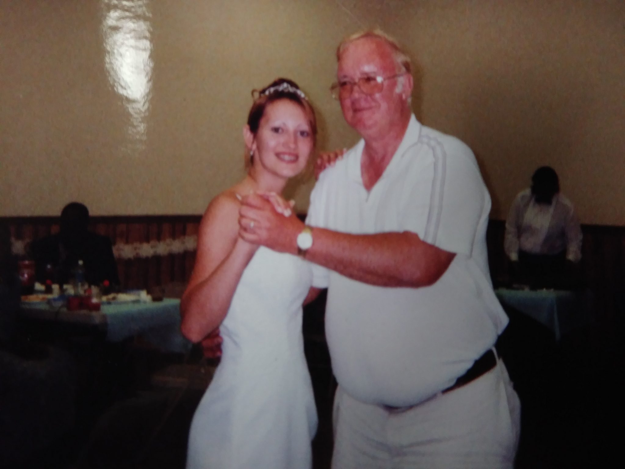 Me and grandpa dancing at my wedding in 2004