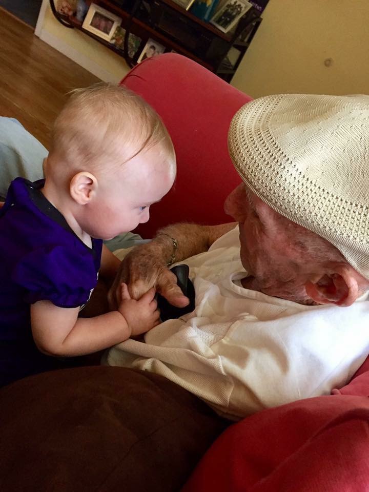 So happy that little Katie got to meet her great grandfather and have moments like this one . Love you Pop.