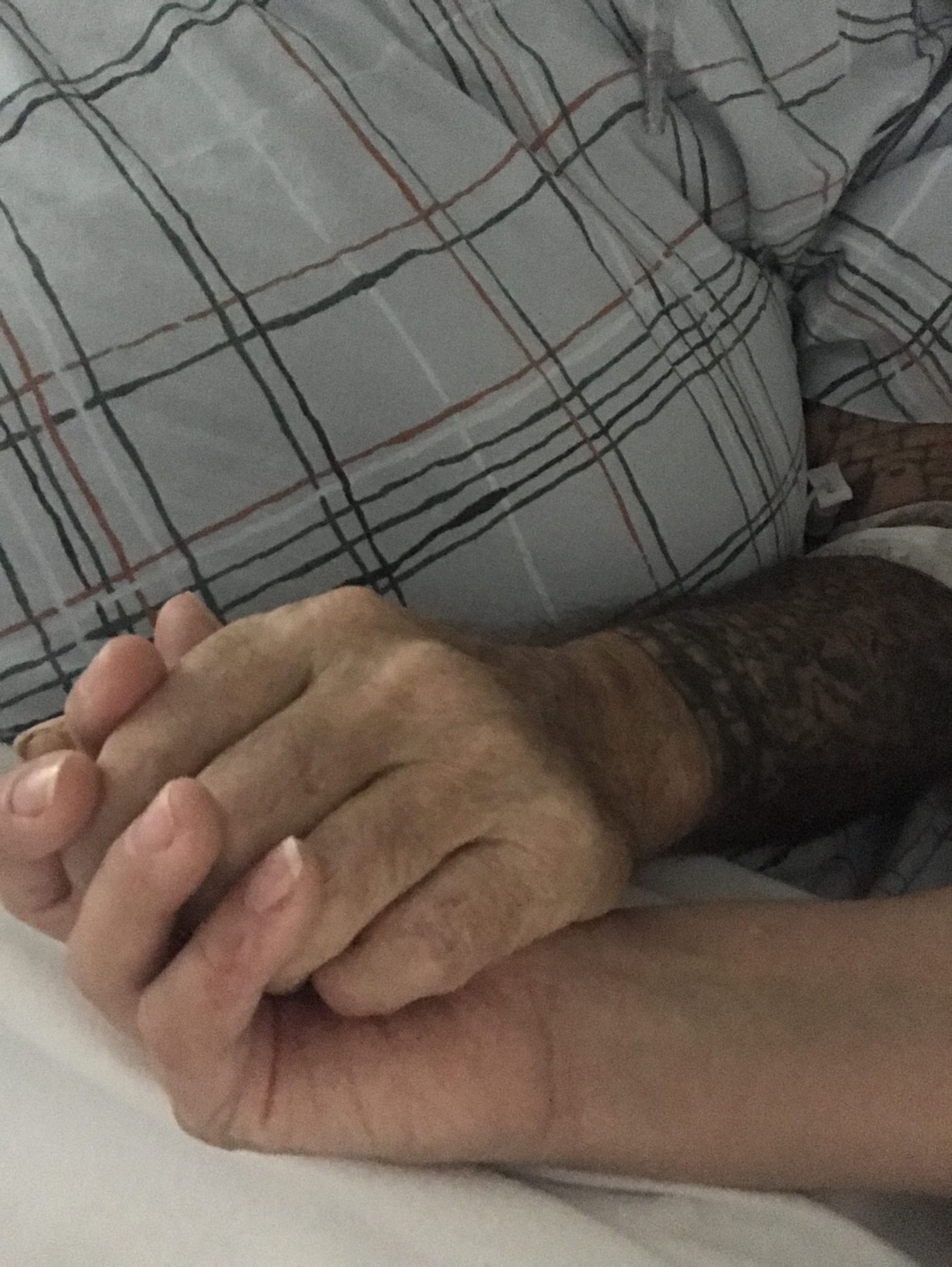 Holding Deans hand in Hospice