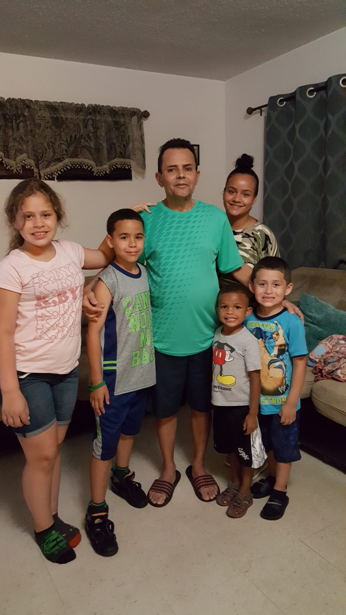 Raul Vargas with his five grandchildren