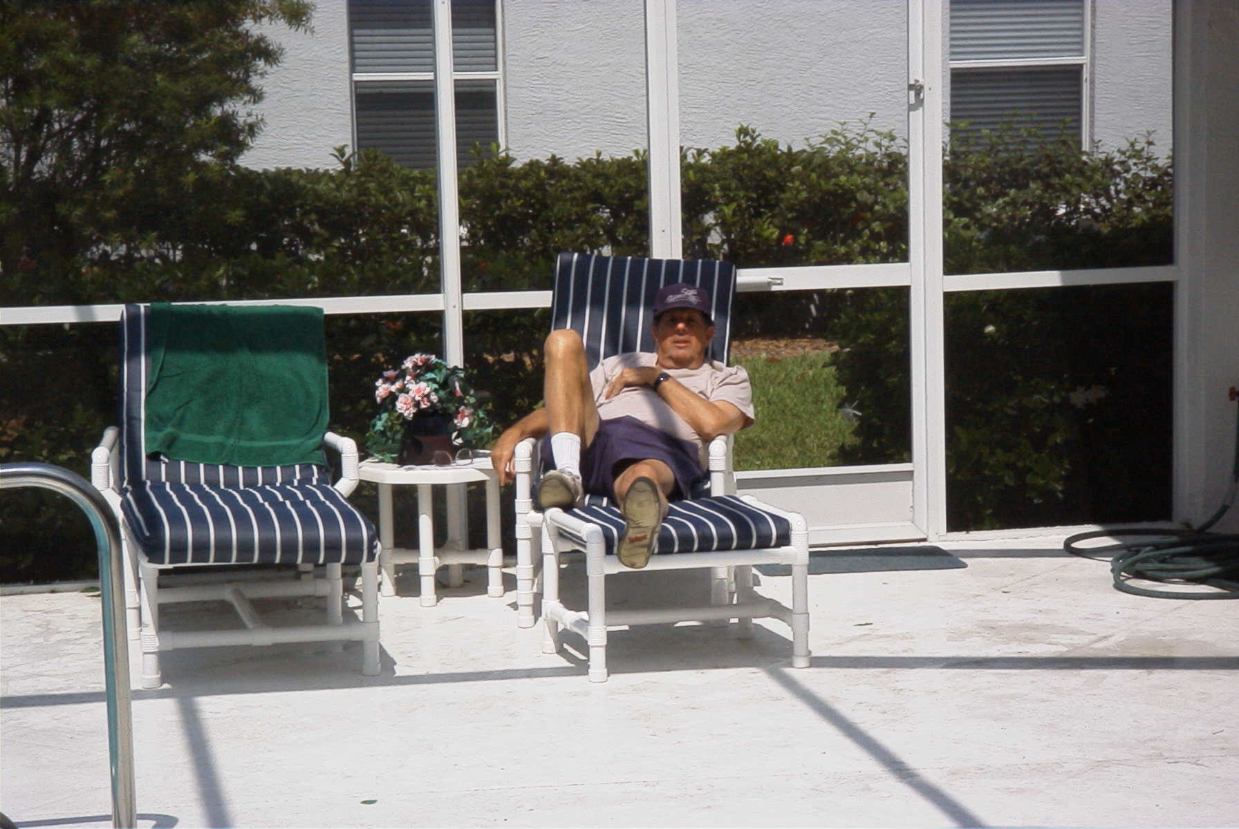 Joel relaxing by the pool. I miss him so much.