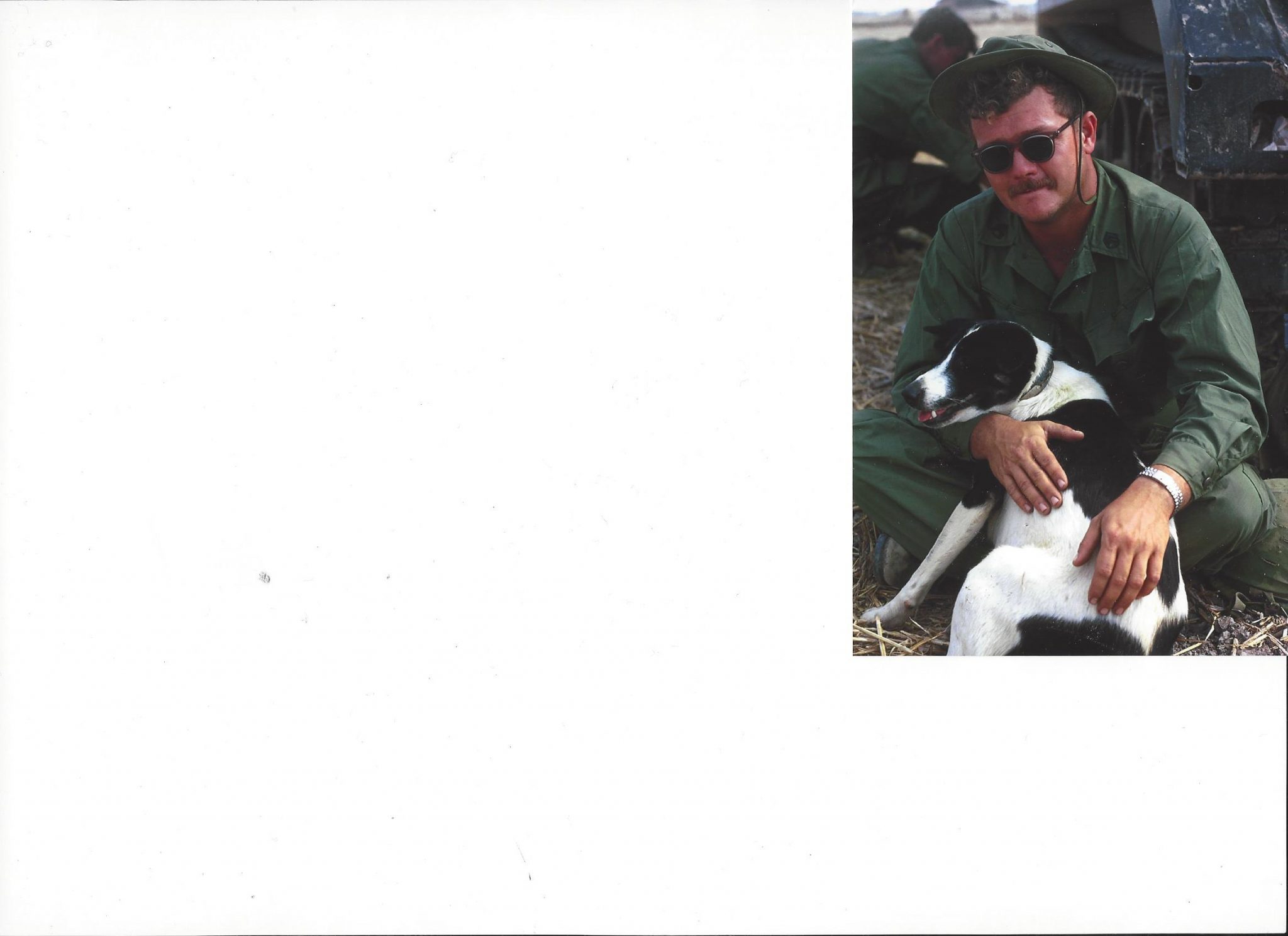 Nelson and a dog in Vietnam.