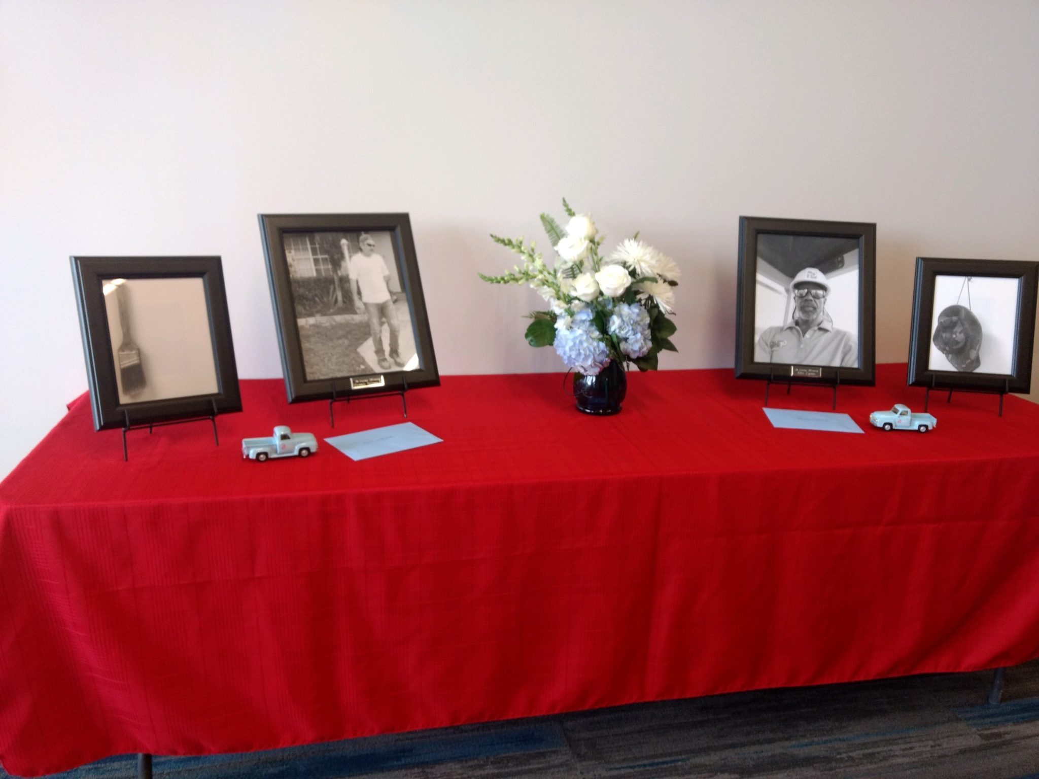 Memorial service table at Dennis's work