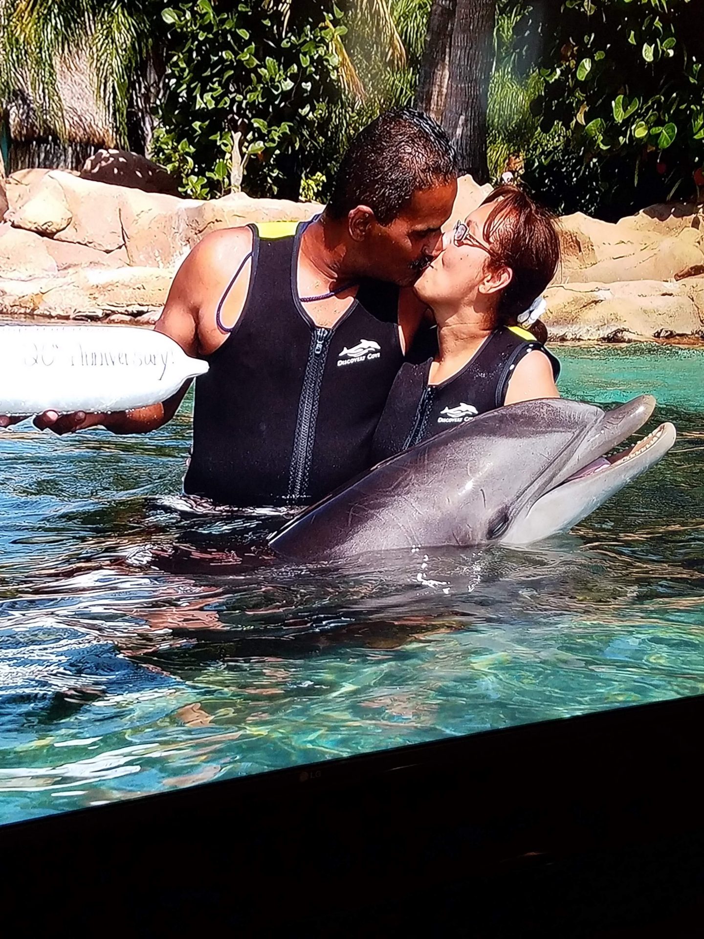 Our 20th Anniversary. We had so much fun at Discovery Cove. I could not swim, you kept holding me up. Love you, God please take care of my husband.