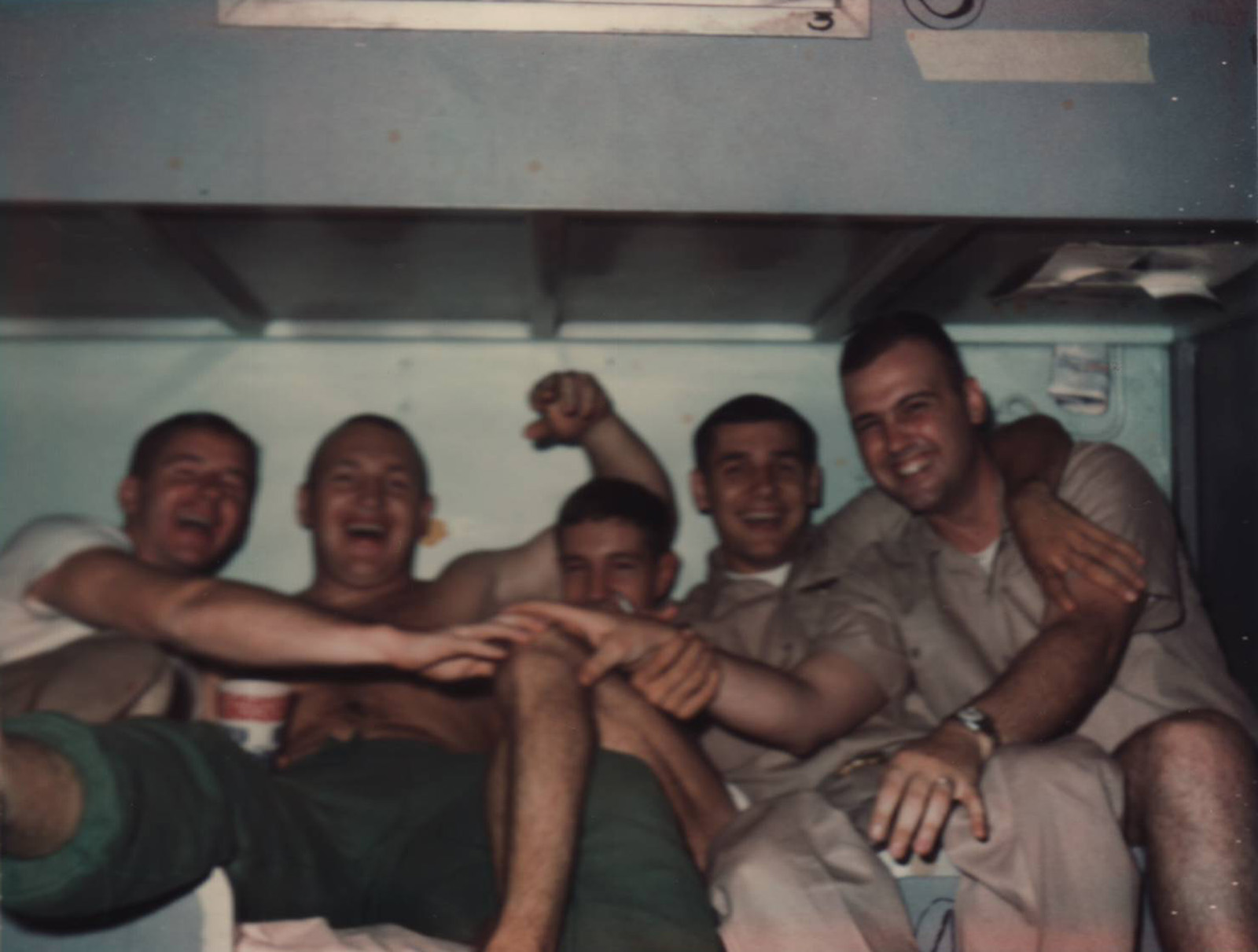 Paul in center with Rich Keenan and Vern Von Sydow to his right; and Rick Grant and Ollie Donelan to his left. The picture was taken aboard the USS Kearsarge during Paul's 1966 deployment flying search and rescue missions in Vietnam.