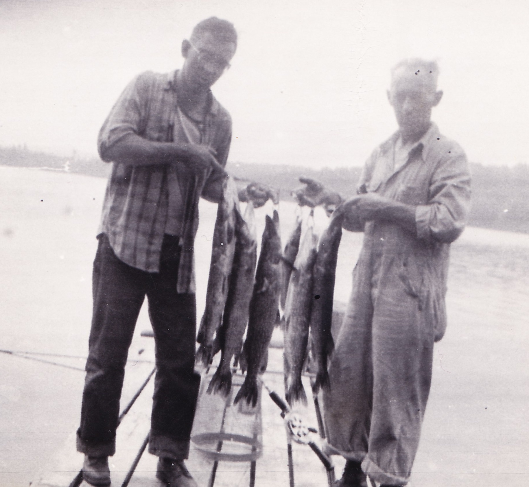 Dick and his father with fish on the farm in Vermon, late 1940s.  Dick loved to look at his old family pictures, and he could tell you the story of every fish in each photo: where, when and how he caught it, with what bait...