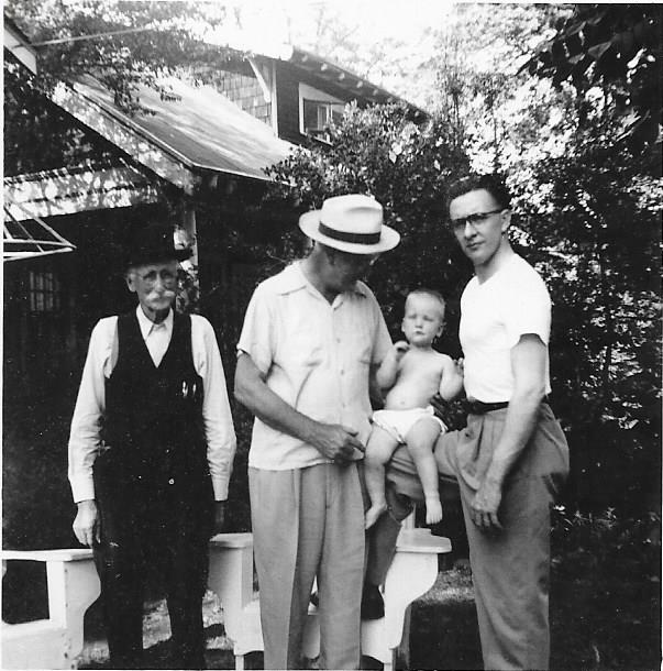 Victor as a bay with his Father, Grandfather and great Grandfather