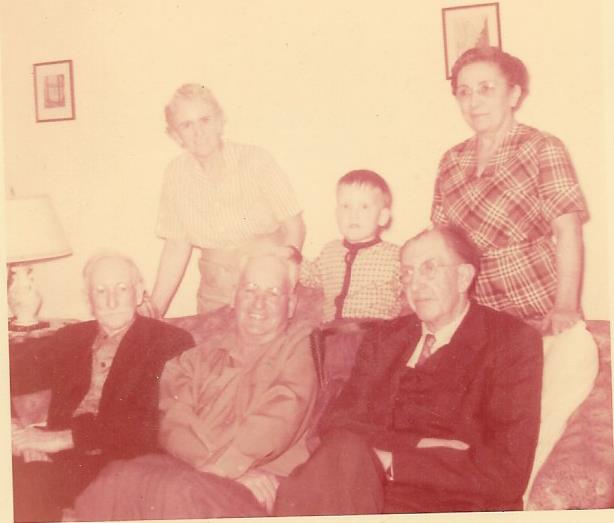 Victor with grandparents and great grandfather (left side front row)