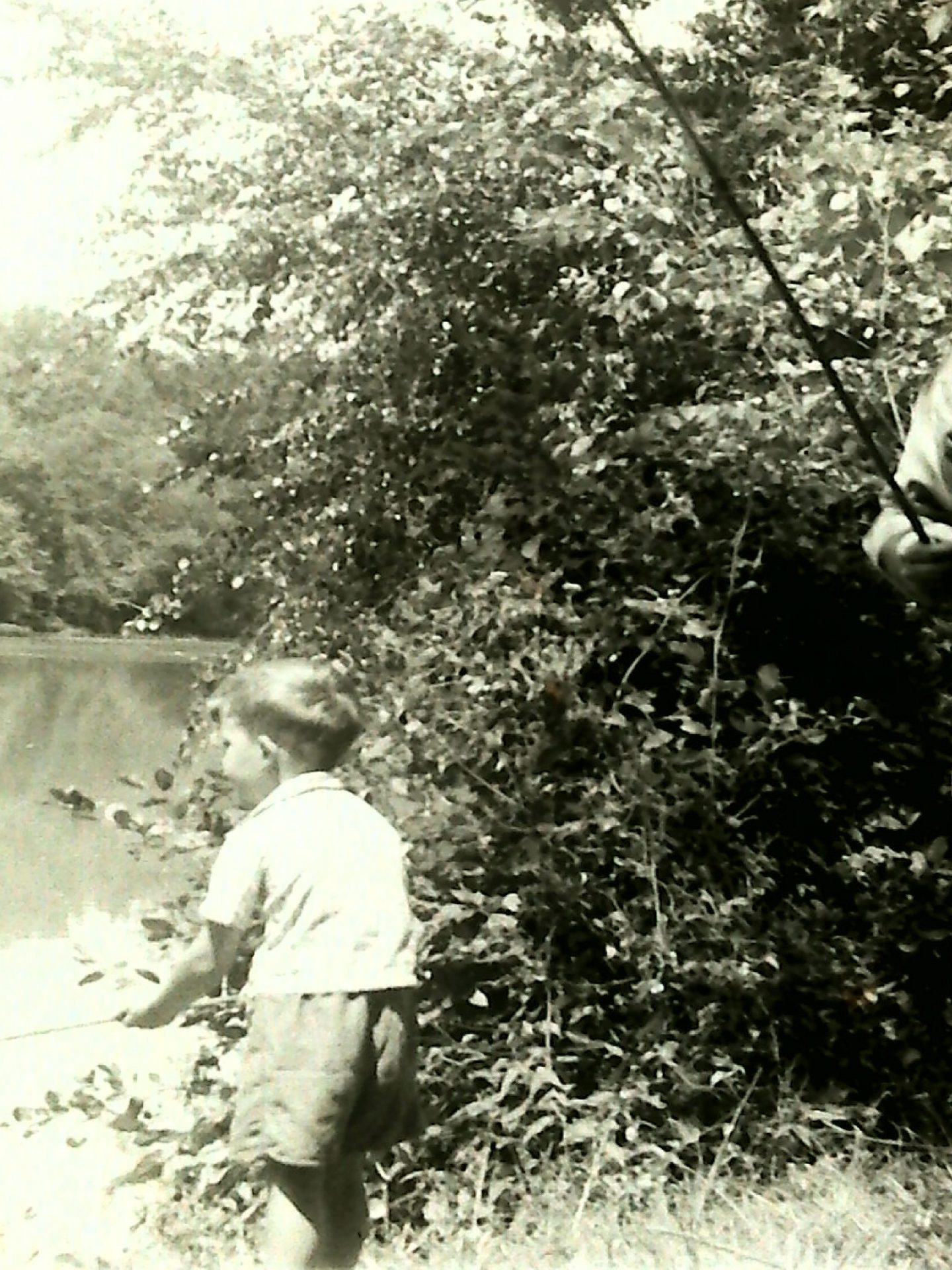 Victor as a little boy fishing with Grandfather Pop at St. Johns River bridge.