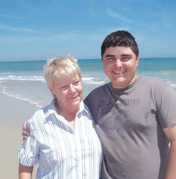 Joy with her grandson Jeremiah at the beach.