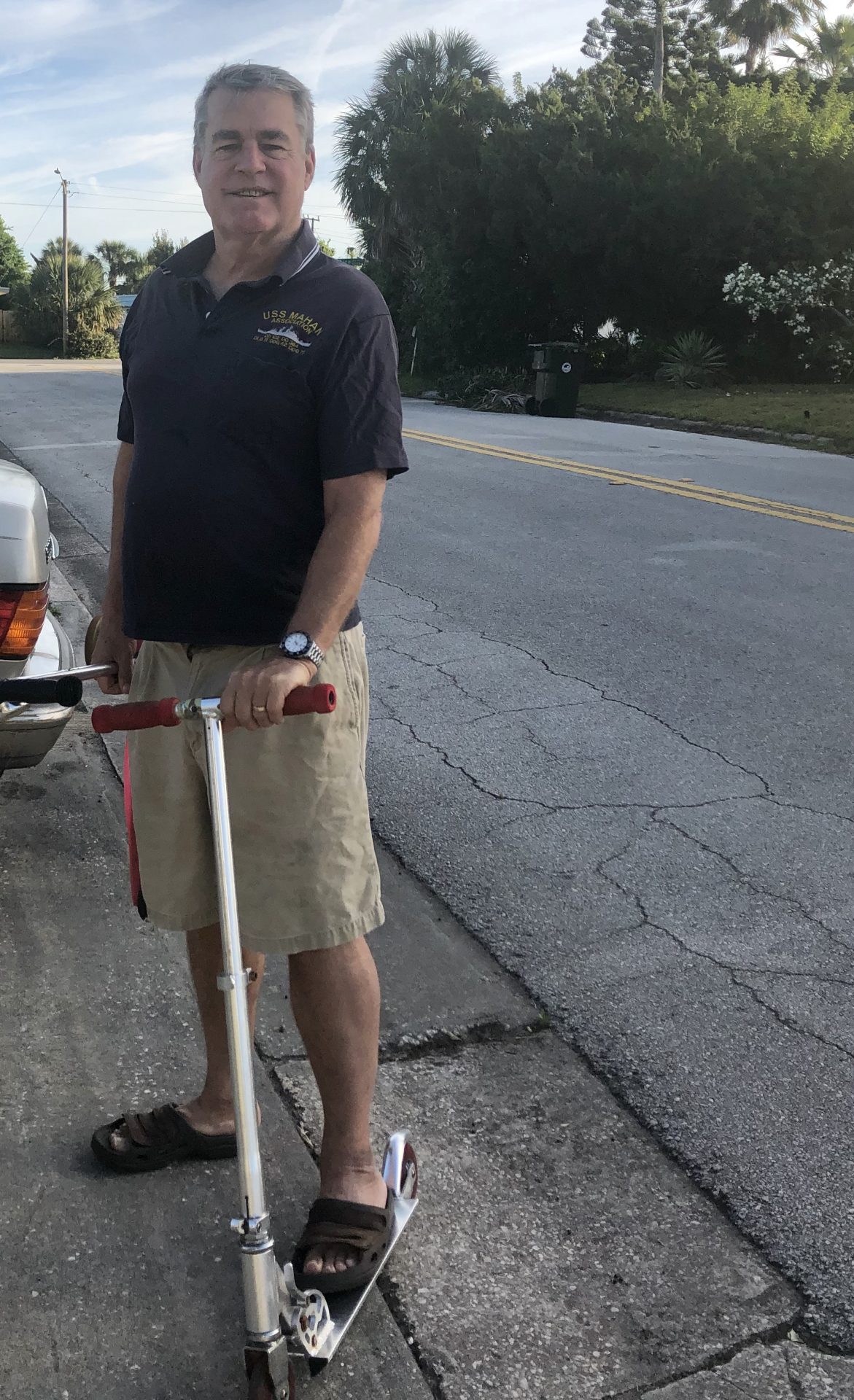 Tom coming back home from dropping girls to school, by scooter.