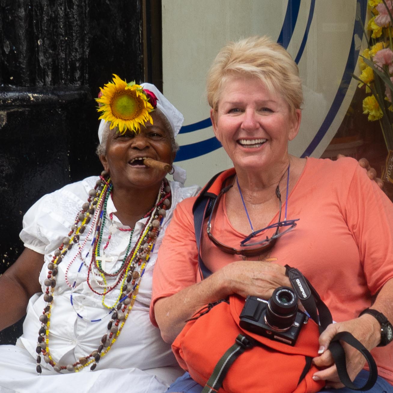 In Old Havana Cuba with a cigar lady.  You pay for your picture.
