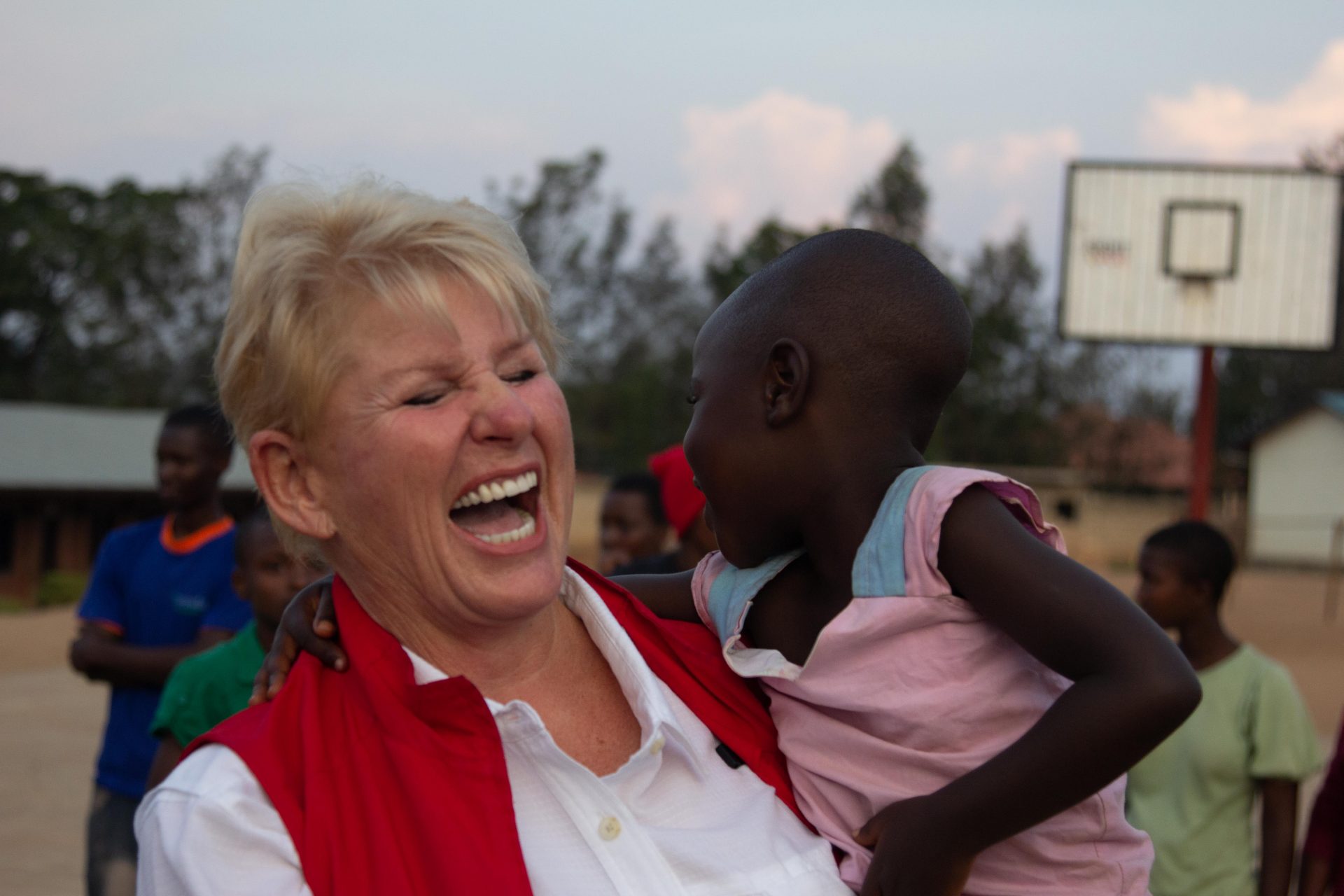 Doing charity work in Kigali, Rwanda with orphans.  We brought books, toys, clothes and danced with the kids.  Sandi had an absolute ball.