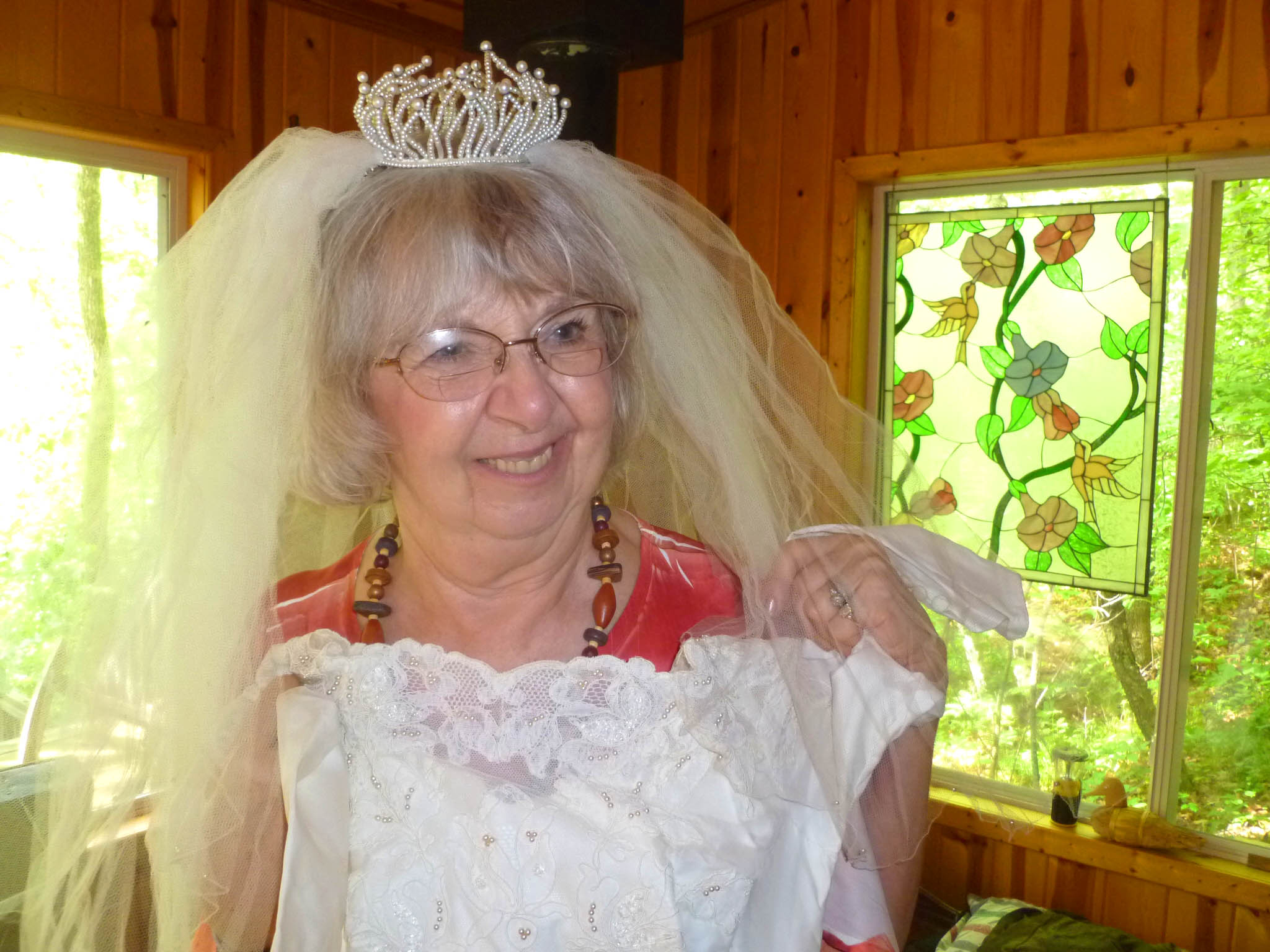 Mom at her 50th, with her wedding dress.