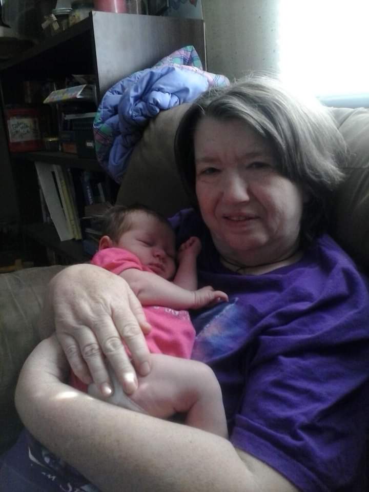 Our favorite pic of her... ok,  one of the favorites.  The first time she met America after she was born.  April 2013