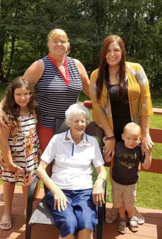Four generations at China Lake in Maine.  Sue with her mom, daughter Jo, and grandchildren Raina and Ryder