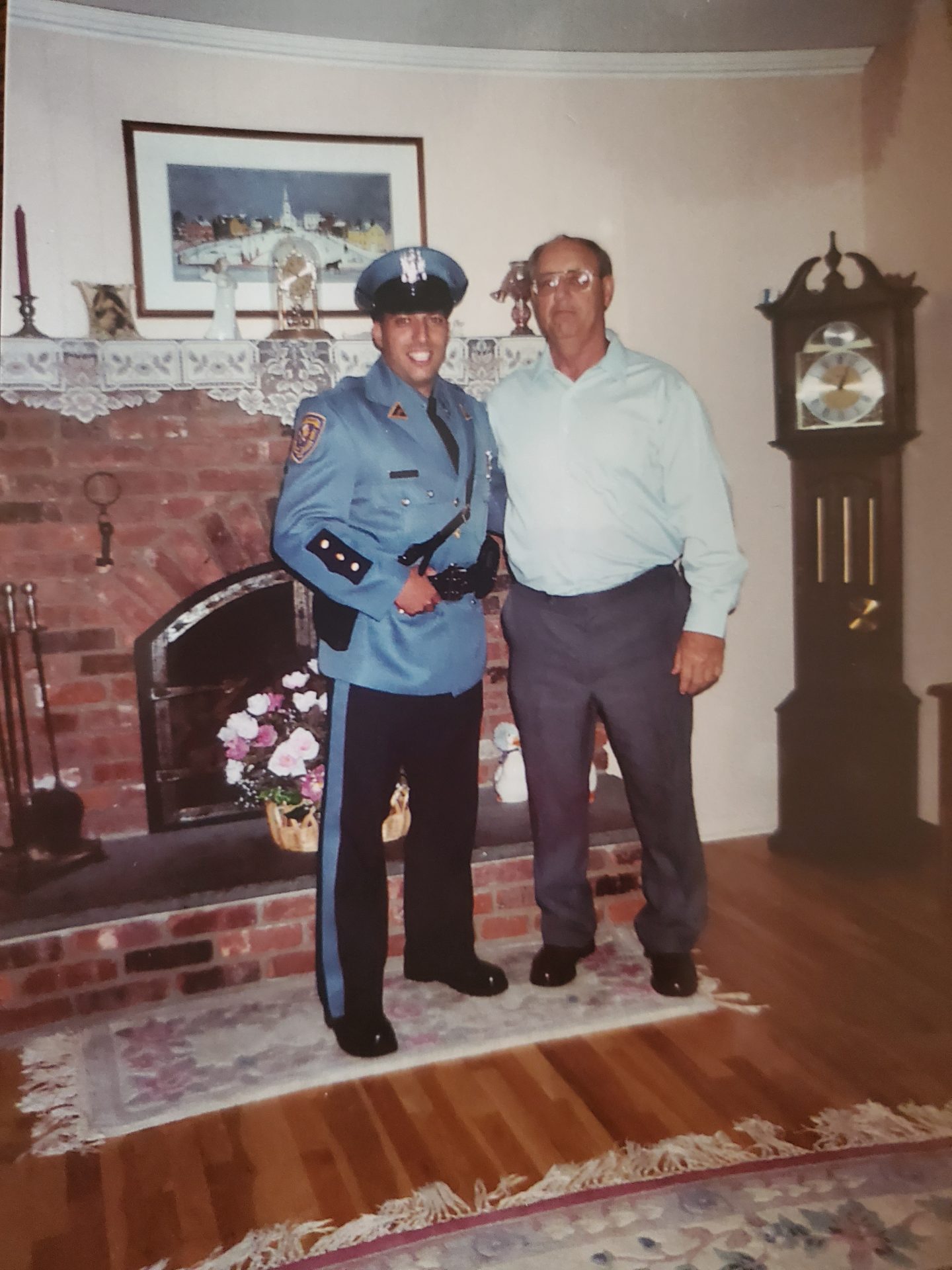 Me and my Godfather after I graduated from the police academy.