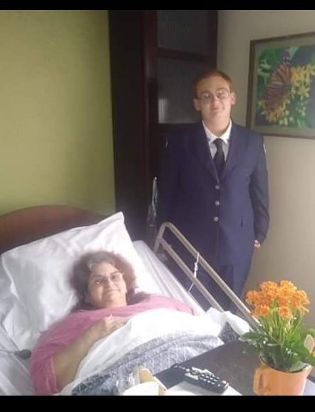Kevin Harold Sona visiting his Grandma before his AFJROTC awards ceremony