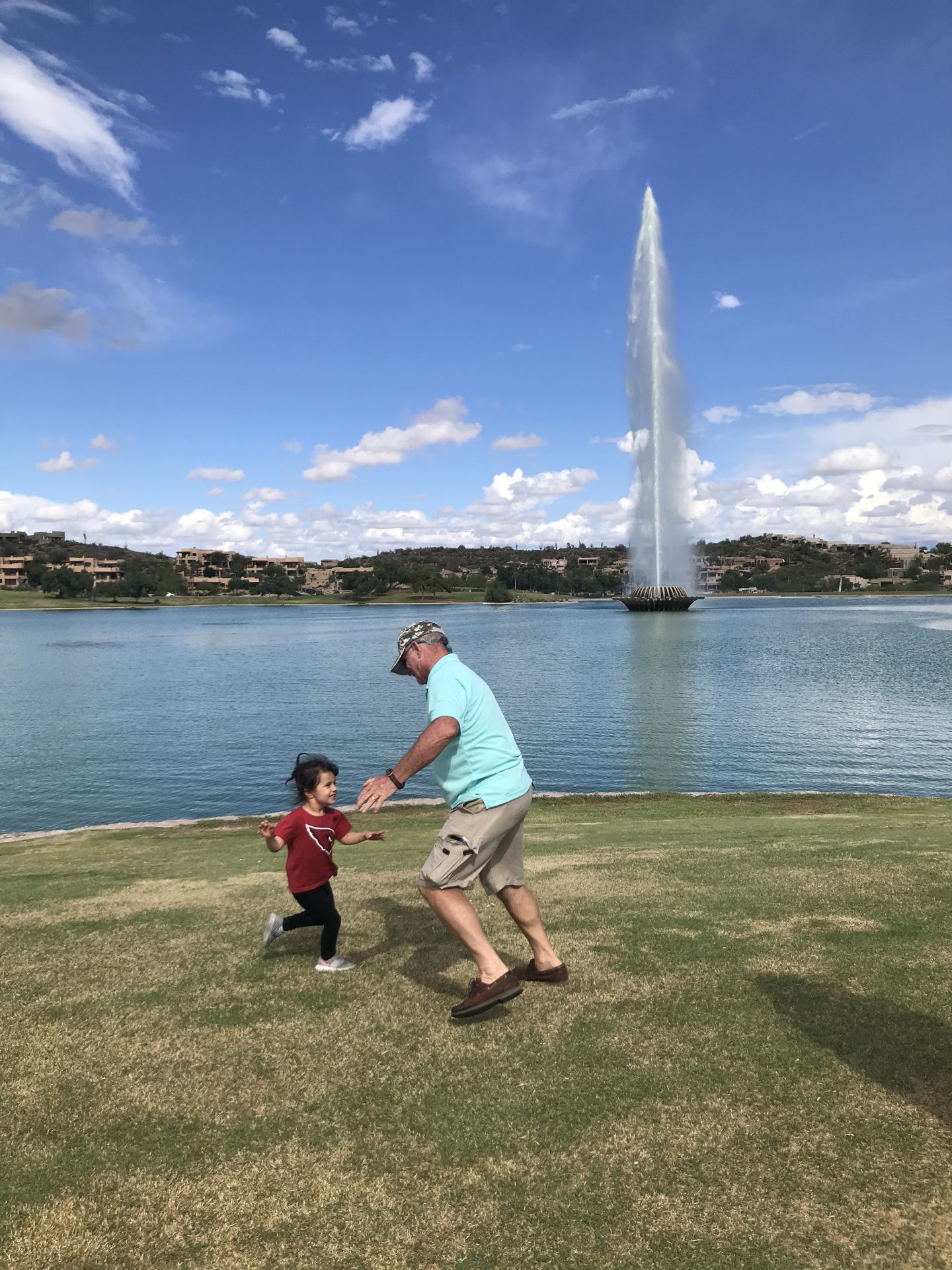 Uncle Dan and Olivia playing at Fountain Hills Park during a trip to AZ