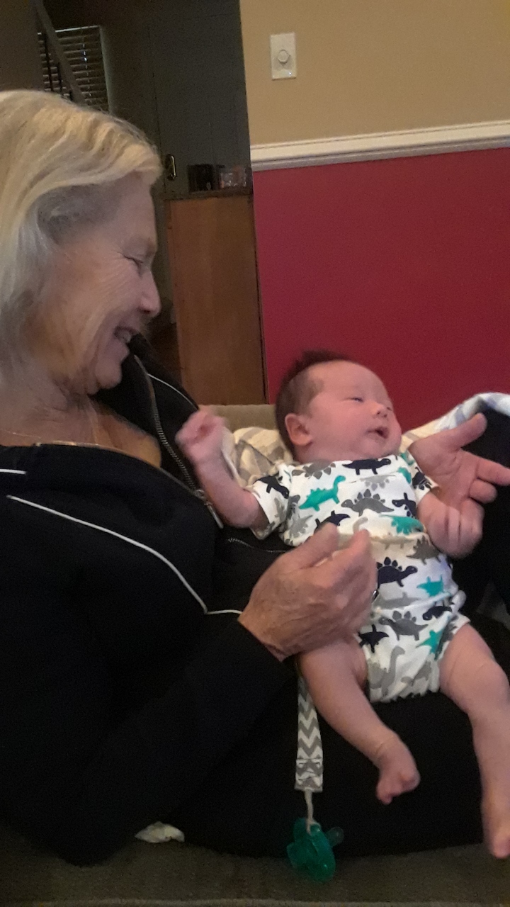 First time meeting her cherished grandson Henry.