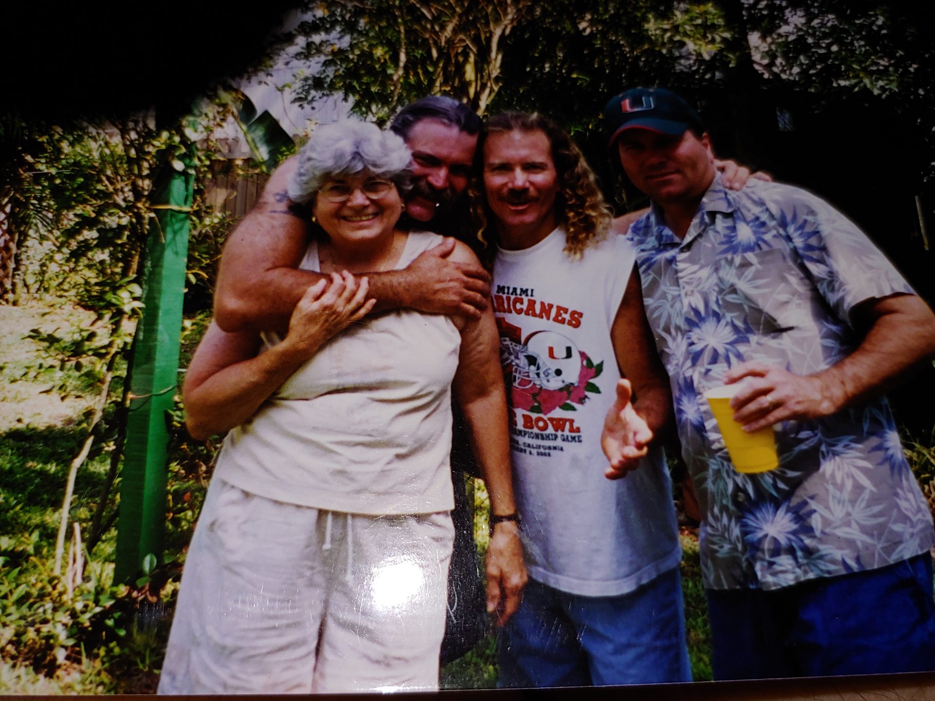 Dean hugging mom with Todd and Mike
