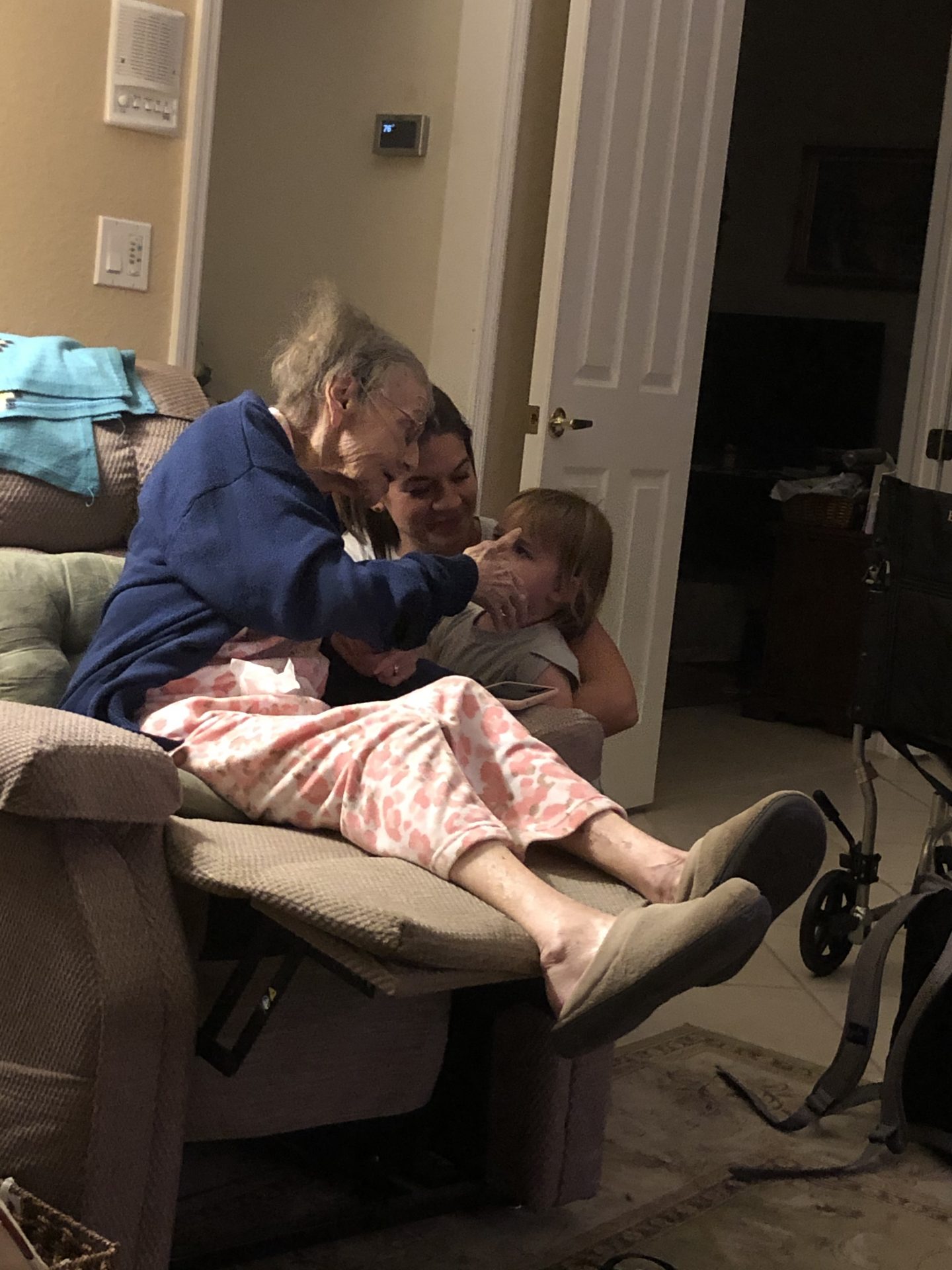 Great Granddaughter listening to Mom