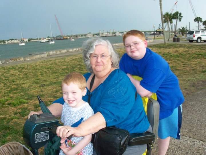 Nan with Chase and John Dolphin watching in St. Augustine