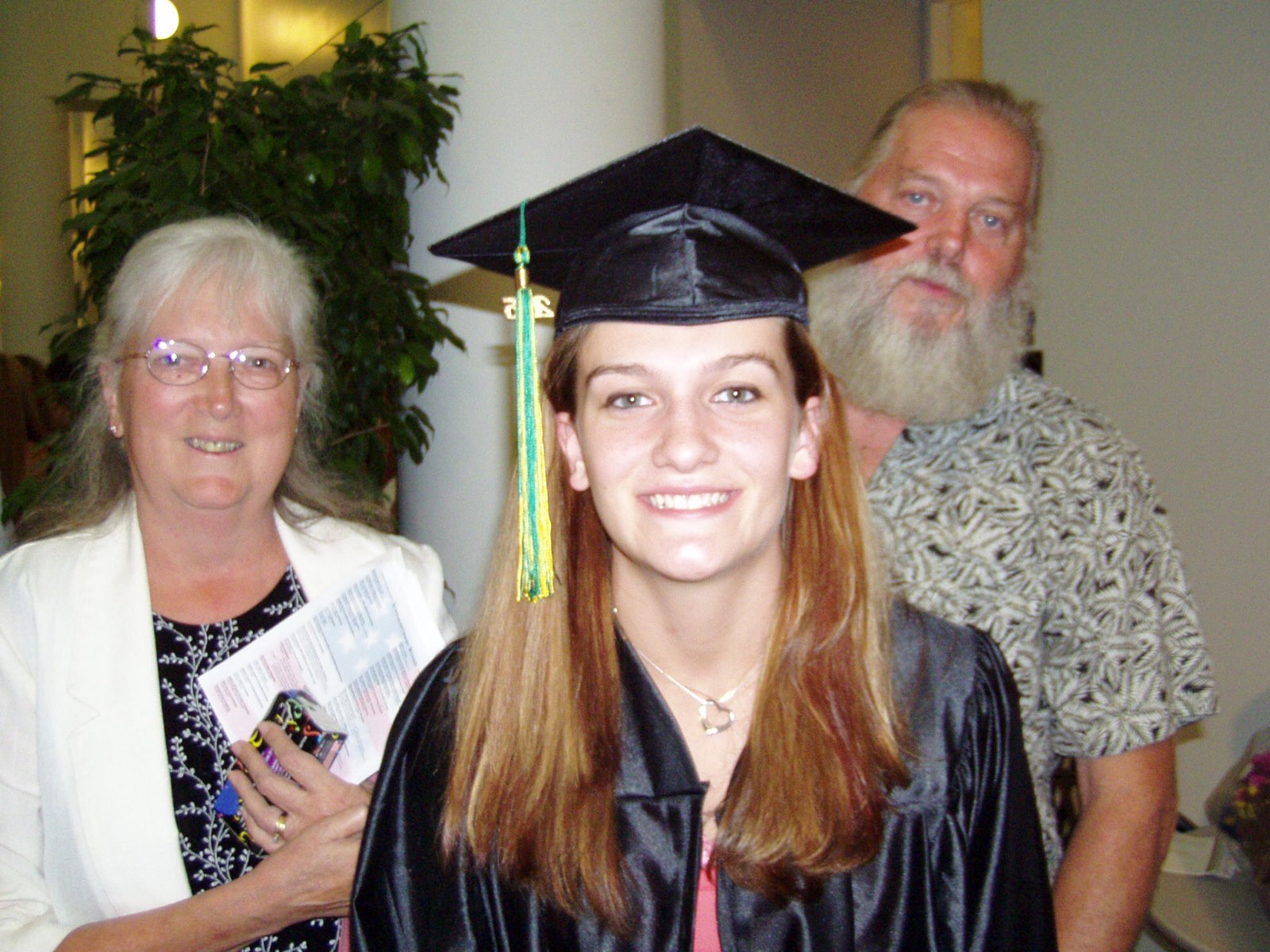 Mom & Homer with their granddaughter Phalyn, at her high school graduation July 2005