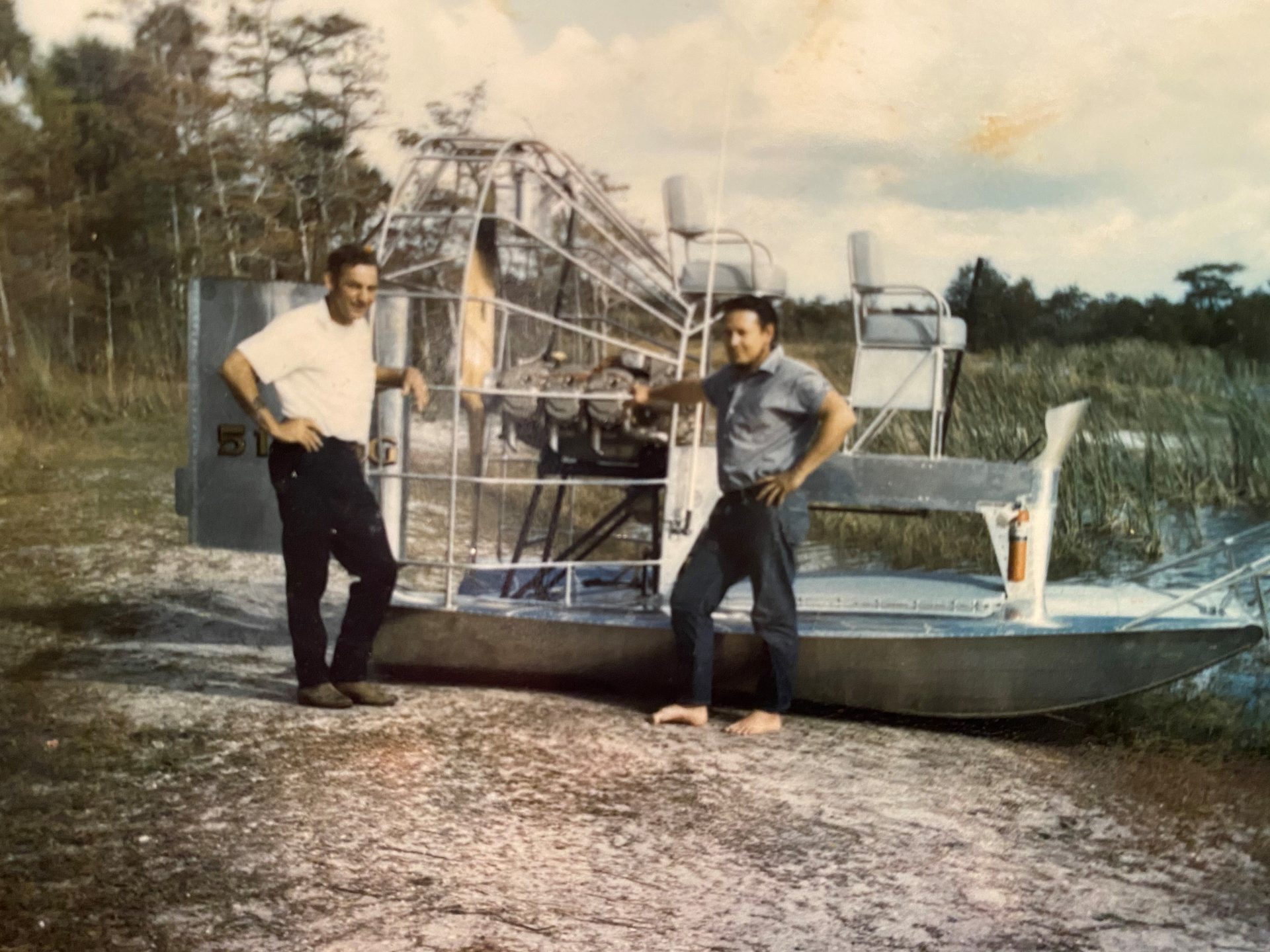 Bobby and ?   Airboat on berm