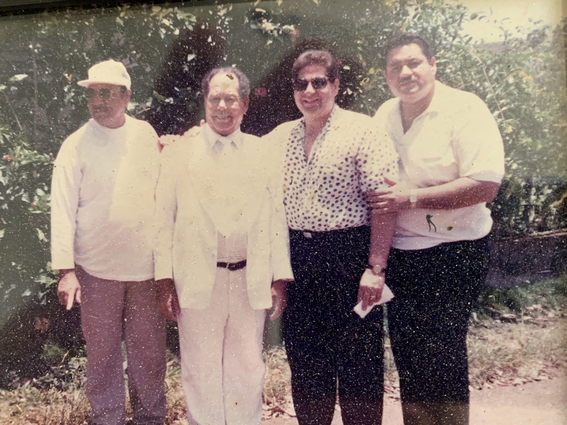 Hey brother Lee. Here we are the Perez clan. Santos, Papi, me and you.  RIP my brother.