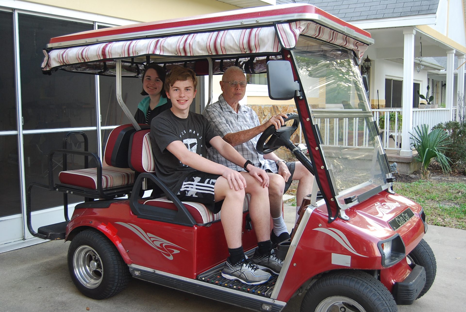 Having fun on Grandpa's golf cart