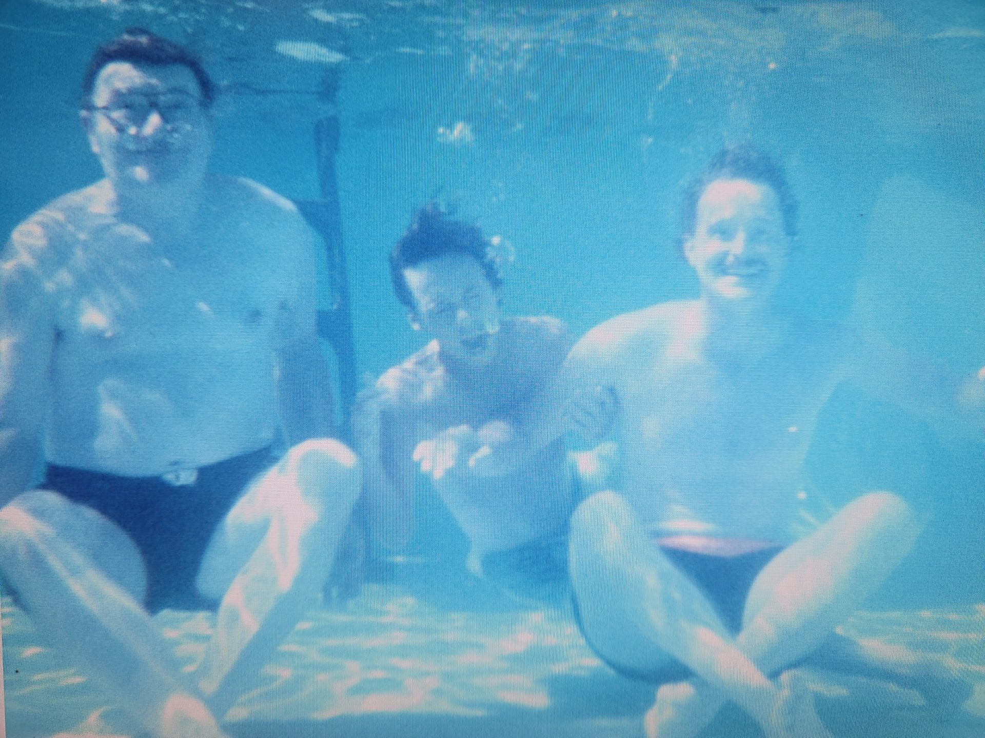 grandad Joe, Steven and Joe about 1988. Full on fun in the backyard pool.