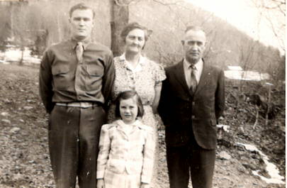 Mom as a little girl with her brother and parents