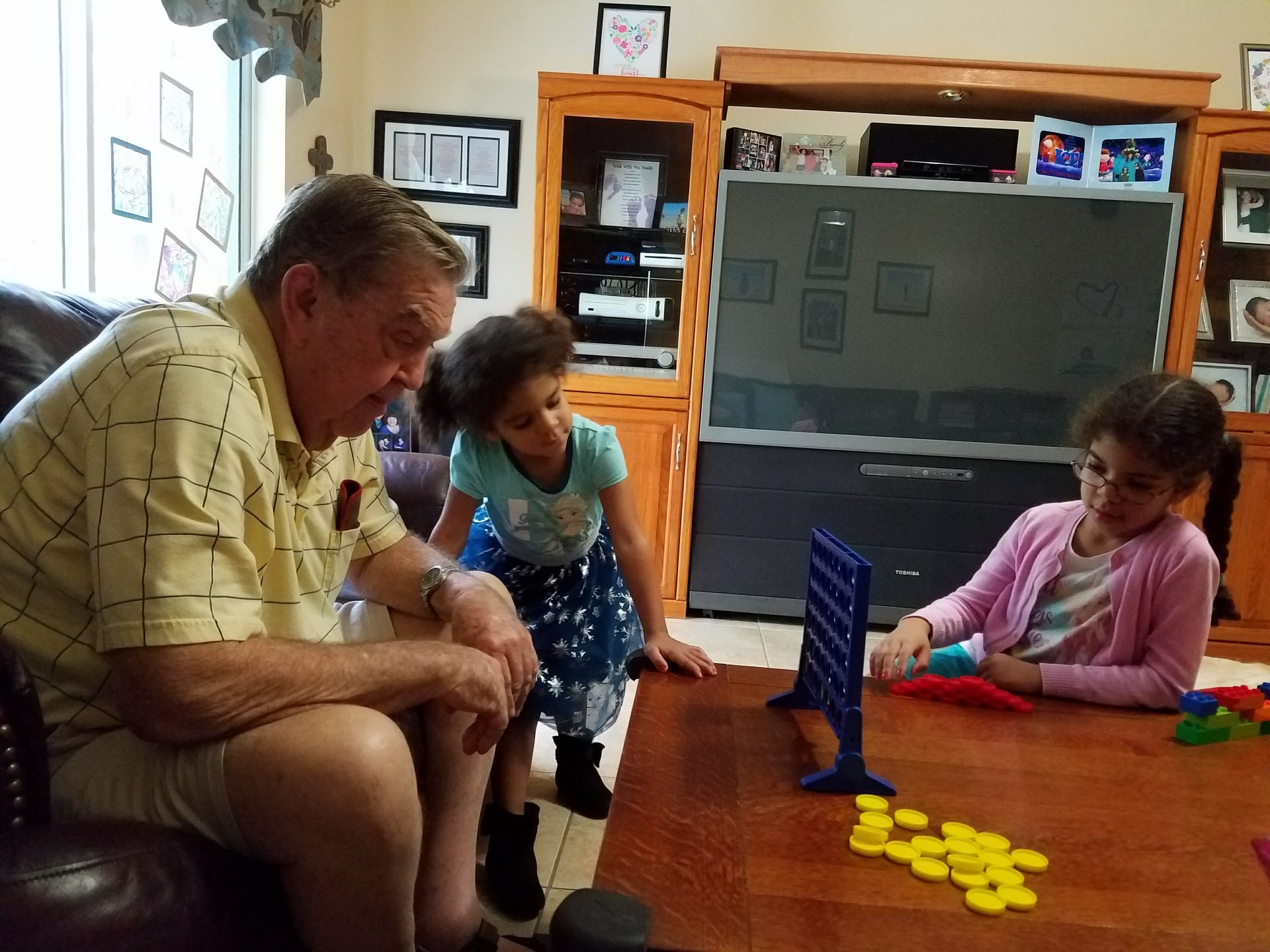Playing 4 in a row with Grandpa