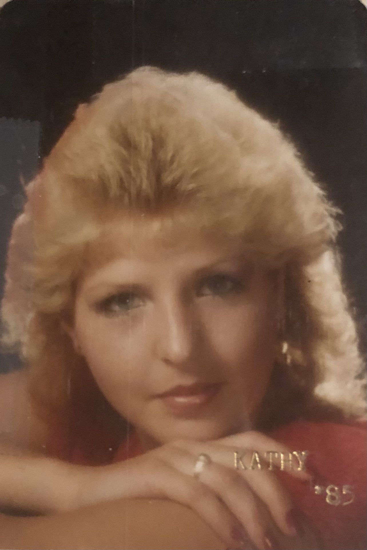 12 th grade graduation picture<br />
On the back Kathy wrote “See you at the Beach” She loved the Sun.