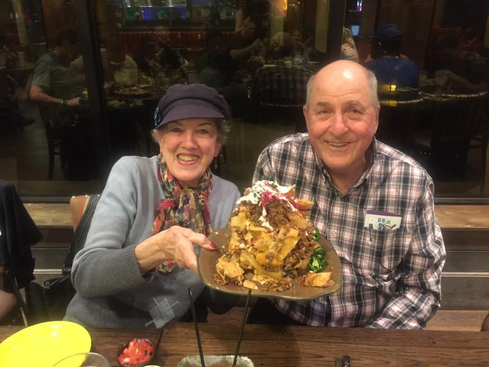 Mom & Dad with the biggest order of Nachos ever.