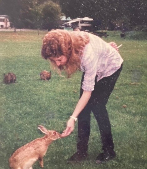 Carol feeding the wild bunnies in Washington in the San Juan  Islands, visiting me. God’s creatures loved her.