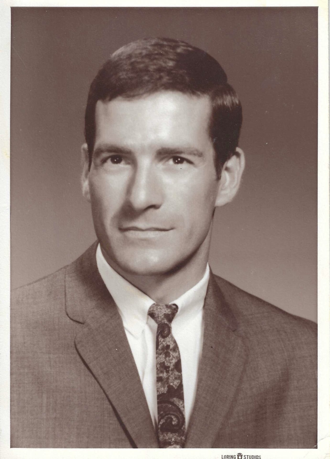 I just got this one, it was his Salem State graduation photo.