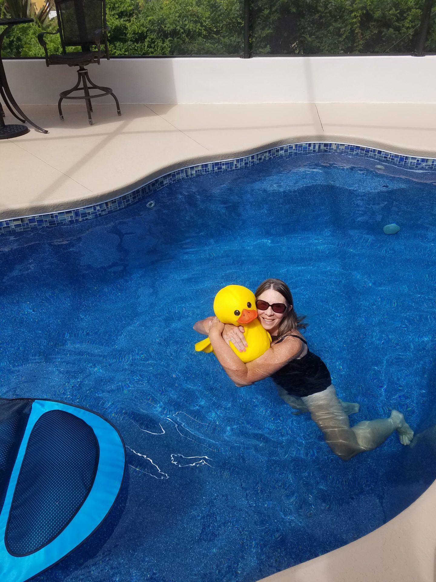 Lynda trying out our pool, that woman loved the water!