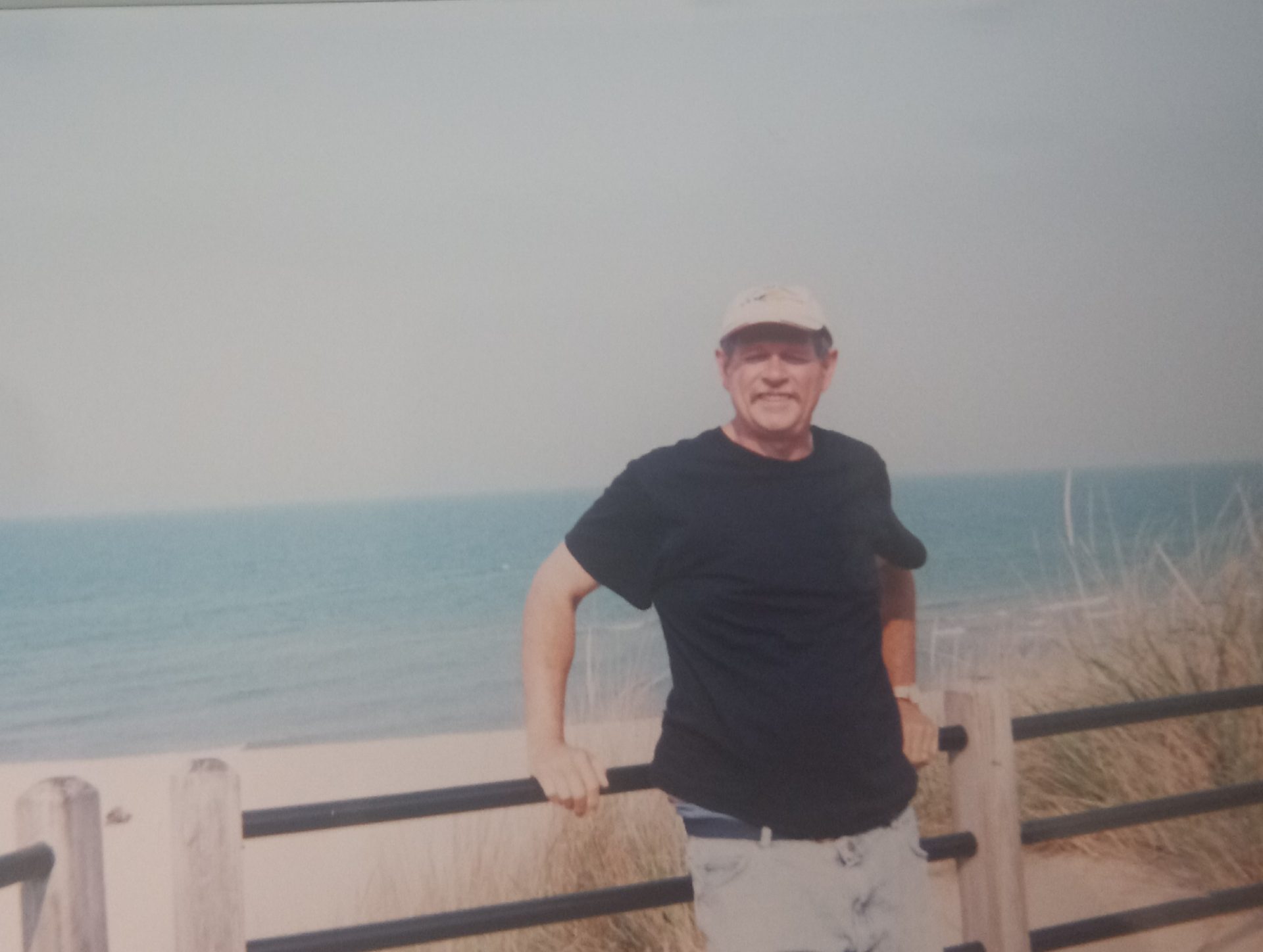 Don posing for Diane near Lake Michigan.